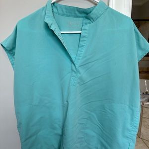 Figs jogger scrub set pants have a small ink stain on back pocket